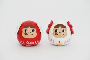 ニチガン 不二家の人気キャラクターを用いた木製だるまをOEM生産